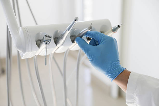 Professional Tooth Extraction technician working in Lowry Crossing, TX